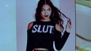 Girl wearing Slut sweater